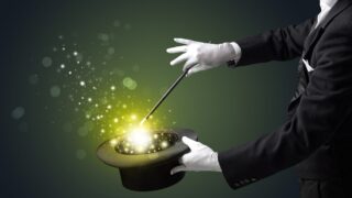 Magic Words to Boost Your Communication, Critical Thinking, and Impact A magician taps his hat to reveal the magic within