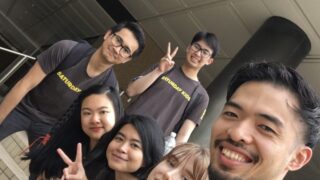 After Searching the Globe, Star Educator Finds Purpose at Home 6 Saturday Kids employees smile for the camera