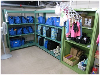 Cleaning supplies for the seven-minute Shinkansen clean are stored neatly in a back room.