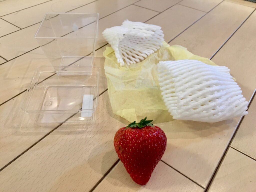 The single strawberry and five pieces of plastic wrapping that gave Robin Lewis the idea for his social enterprise, mymizu