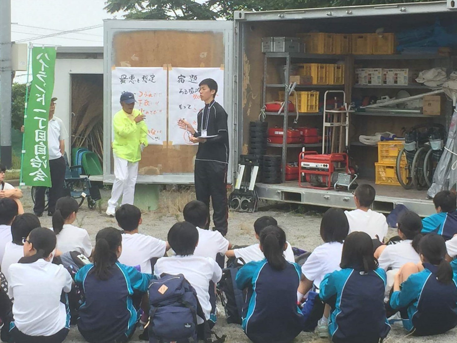 Chikara Takeoka speaks to students as part of the neighborhood council.