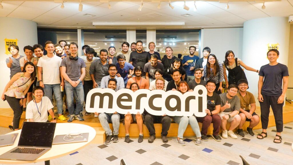 A group of office workers at Mercari offices in Japan.