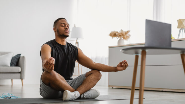 Man seated doing a visualization exercise