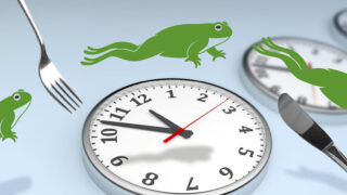 What Does Eating the Frog Mean? A frog jumping over a clock, being chased by a knife and fork